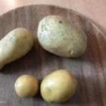 4 Kartoffeln unterschiedlicher Größe